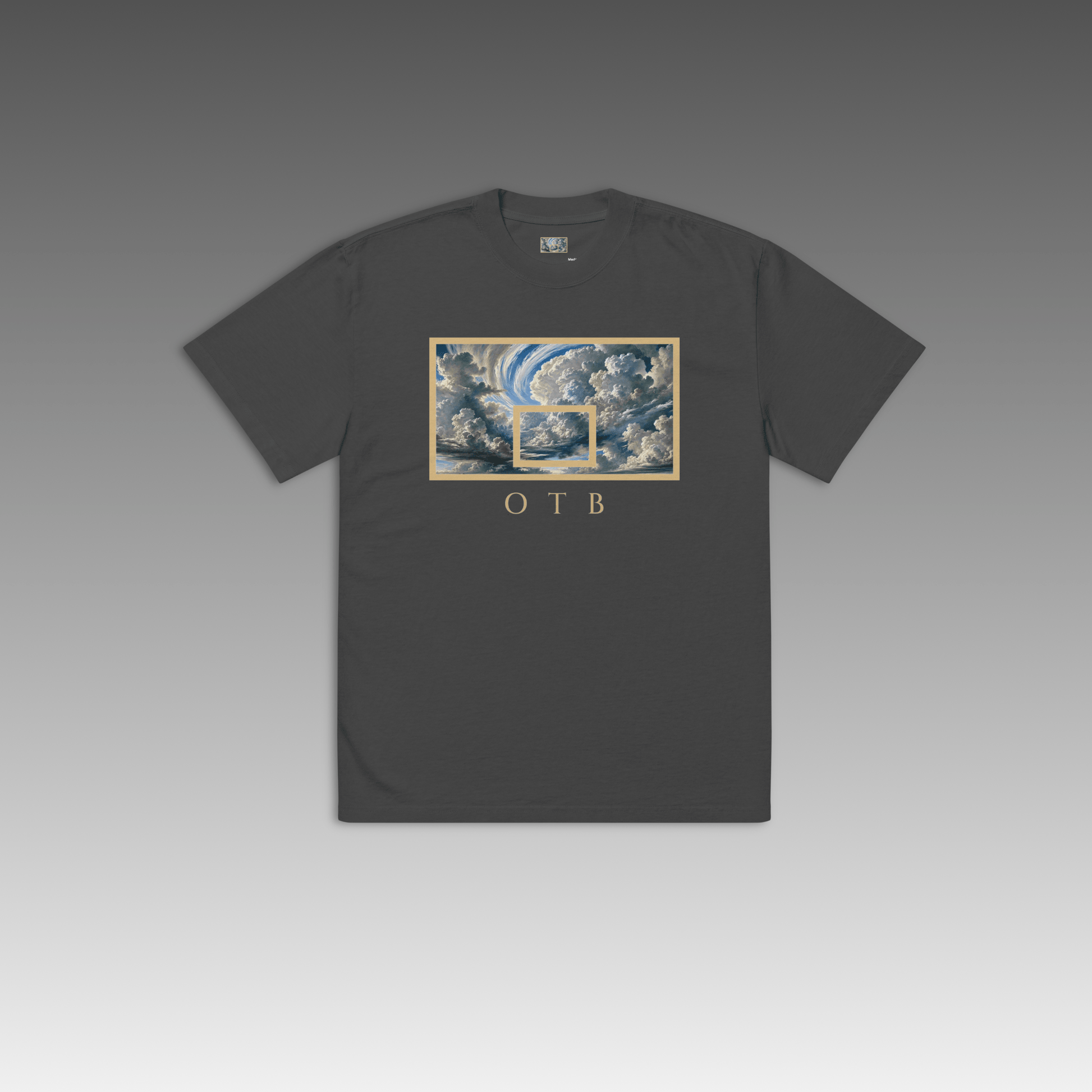 OTB Oversized Tee in Above The Clouds design - front view showcasing light blue oversized t-shirt with dreamy cloud pattern graphics, featuring relaxed fit and premium cotton fabric for ultimate comfort