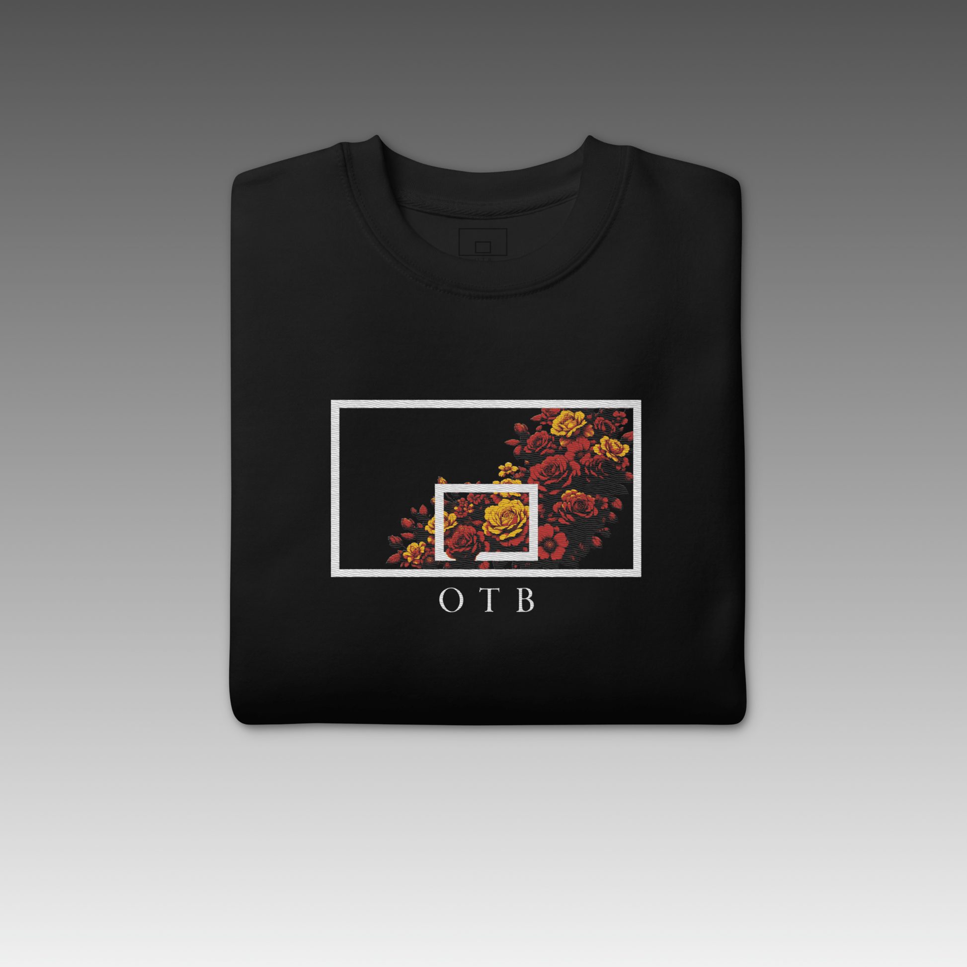 OTB Embroidered Sweatshirt in Floral Burst Large Design - close-up view highlighting the intricate embroidered floral burst details and premium stitching quality