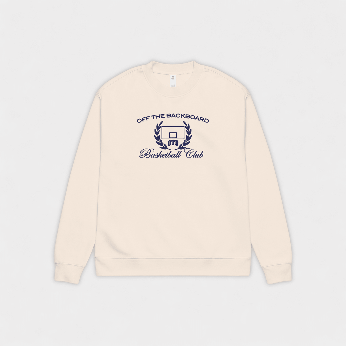 Beige sweatshirt with 'Off The Backboard Basketball Club' text on a light gray background