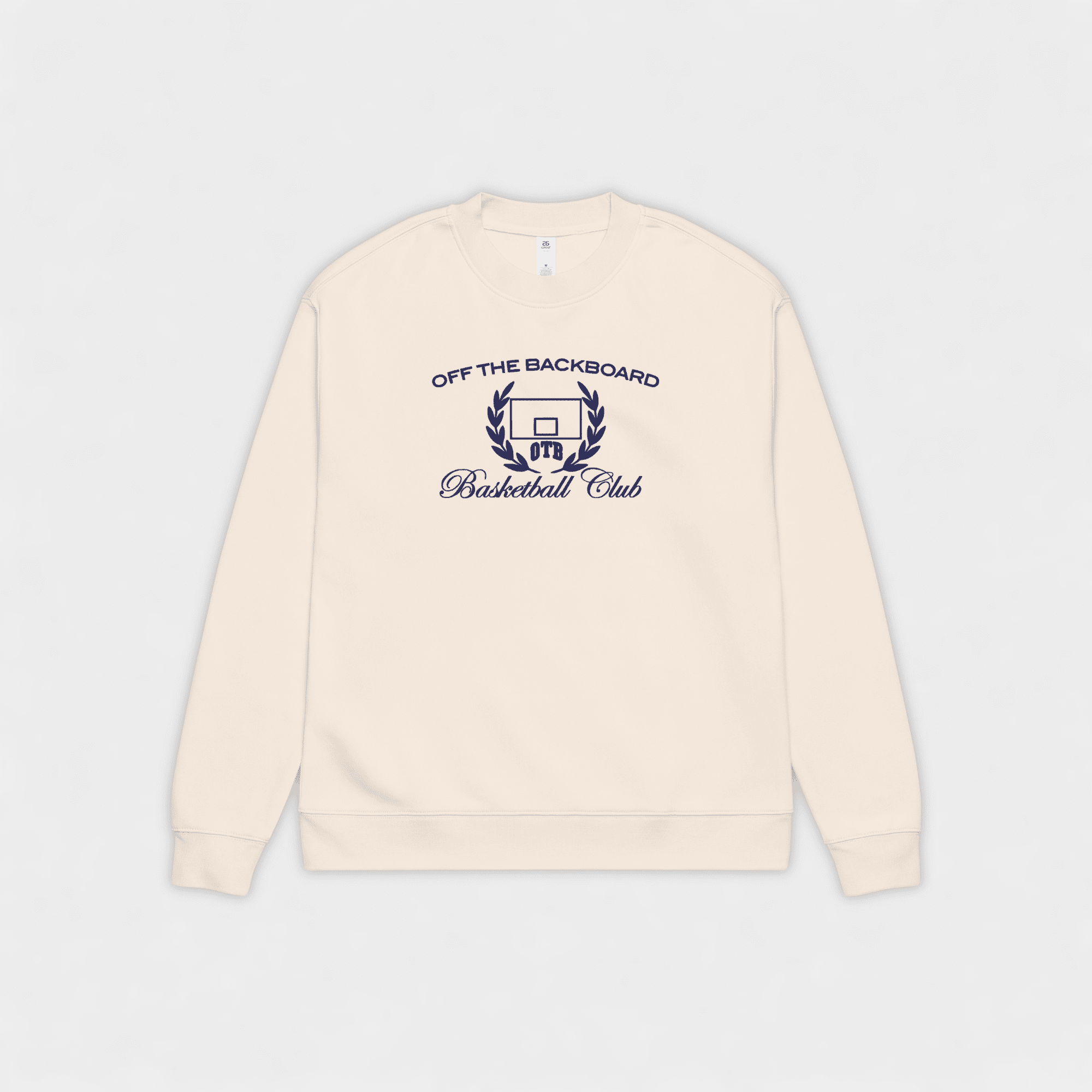 Beige sweatshirt with 'Off The Backboard Basketball Club' text on a light gray background