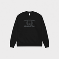Black sweatshirt with OTB logo on a light gray background