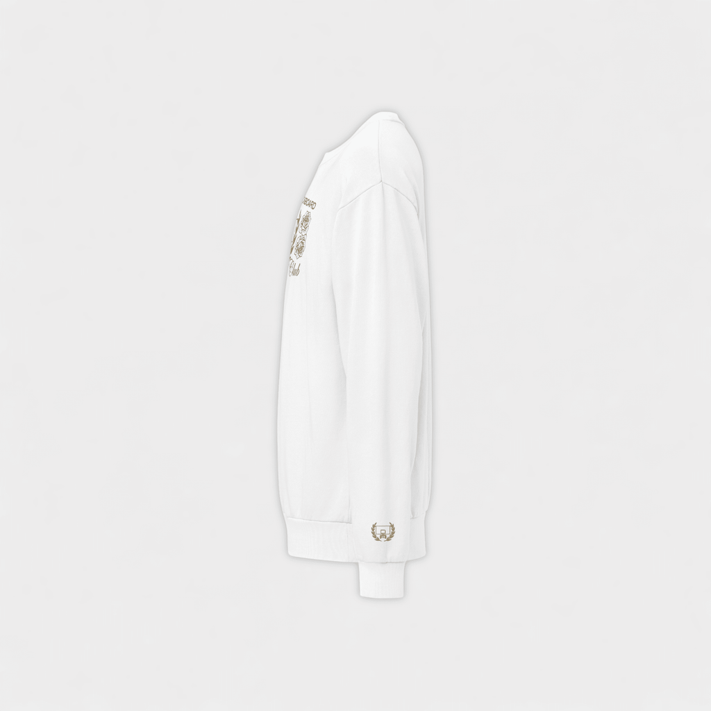 White sweatshirt with gold accents on a light gray background