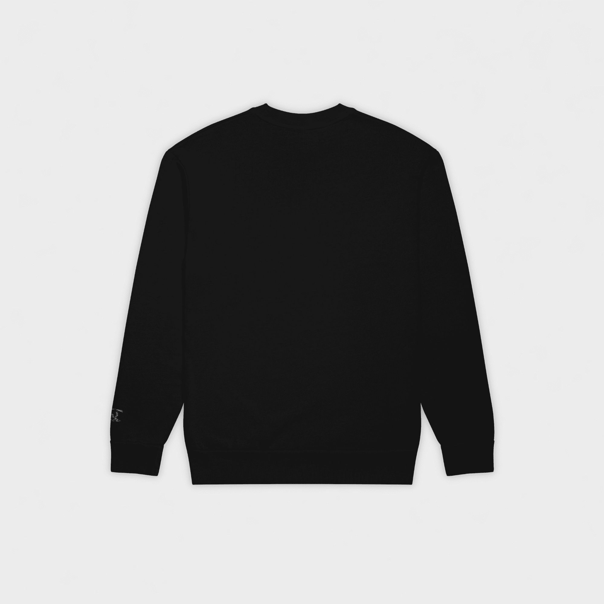 Black sweater on a light gray background