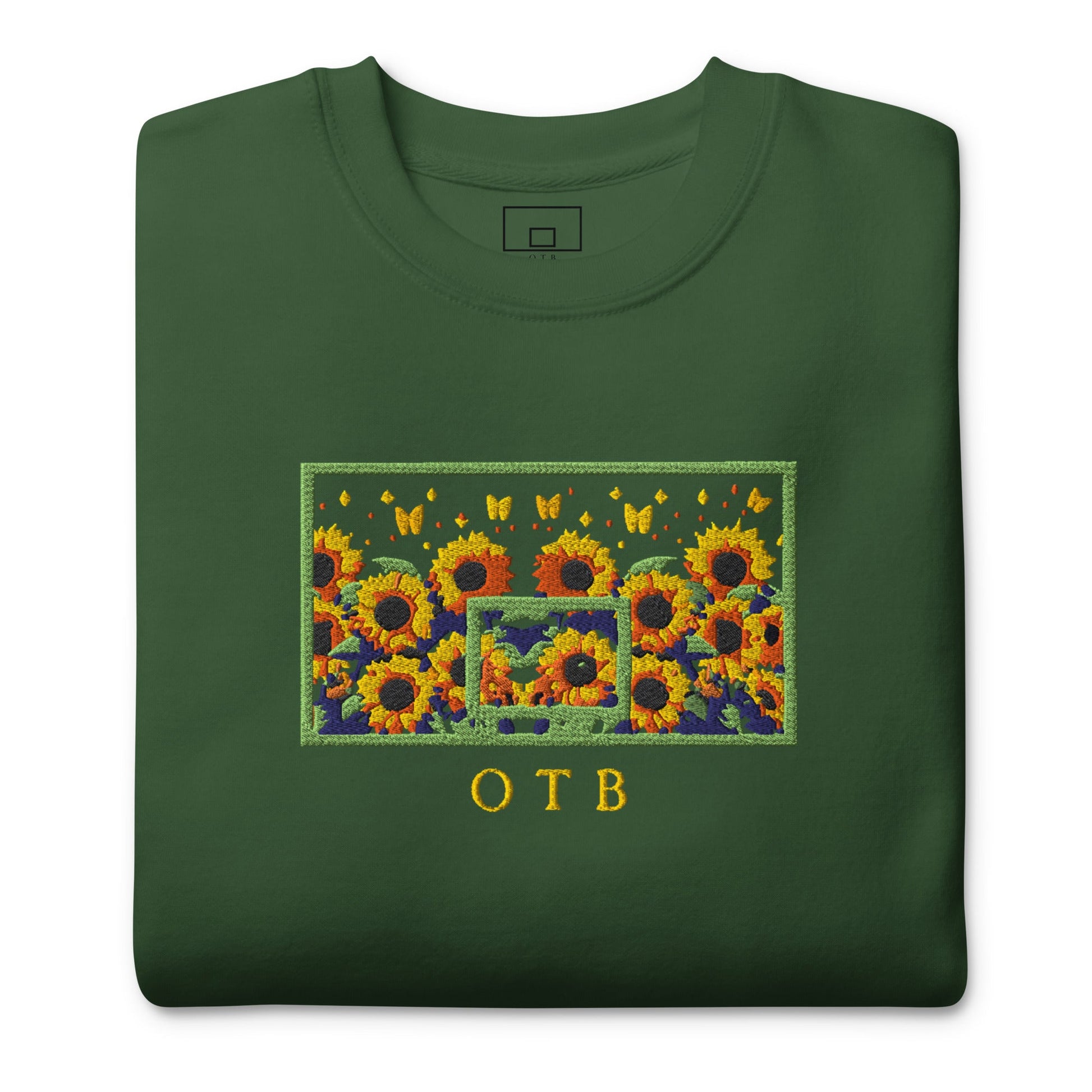 OTB Embroidered Sweatshirt in Sunflower design - close-up view highlighting the intricate embroidered sunflower details and premium stitching quality