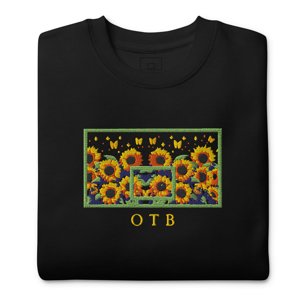OTB Embroidered Sweatshirt in Sunflower design - close-up view highlighting the intricate embroidered sunflower details and premium stitching quality