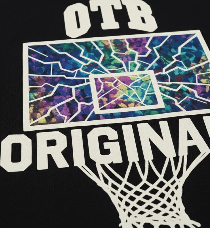 Black t-shirt with a colorful basketball hoop graphic and 'OTB Original' text.