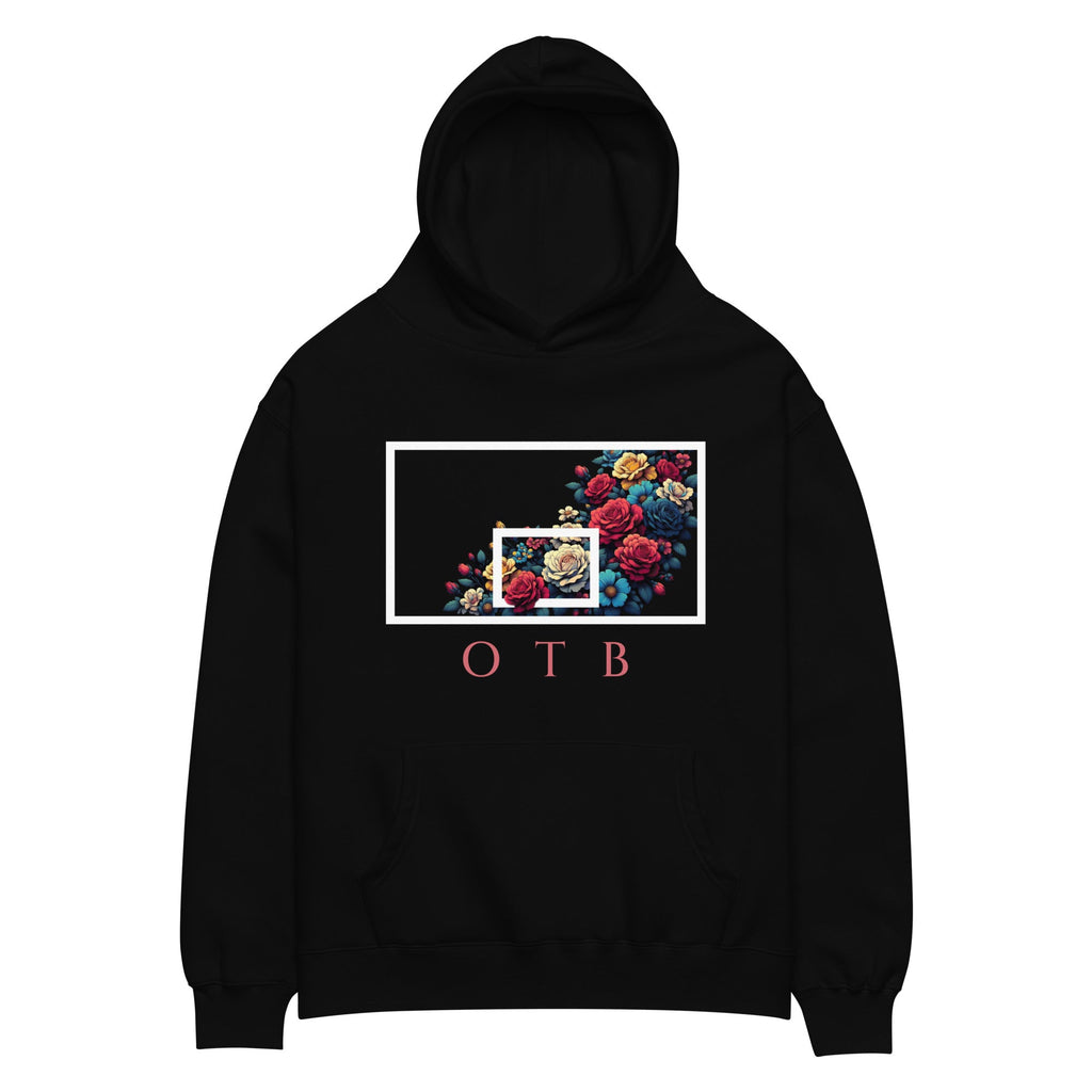 OTB Premium Hoodie in Floral Burst design - front view showcasing a black hoodie with vibrant floral burst graphics and colorful flower artwork, featuring premium heavyweight fabric and comfortable kangaroo pocket