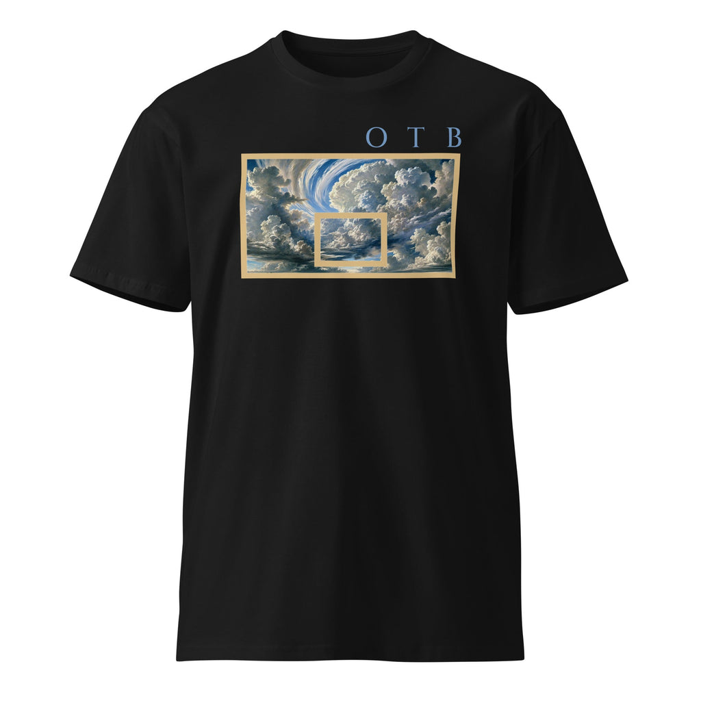 OTB Premium Tee in Above The Clouds design - front view showcasing light blue t-shirt with dreamy cloud pattern graphics, made from high-quality premium cotton fabric for comfort and style