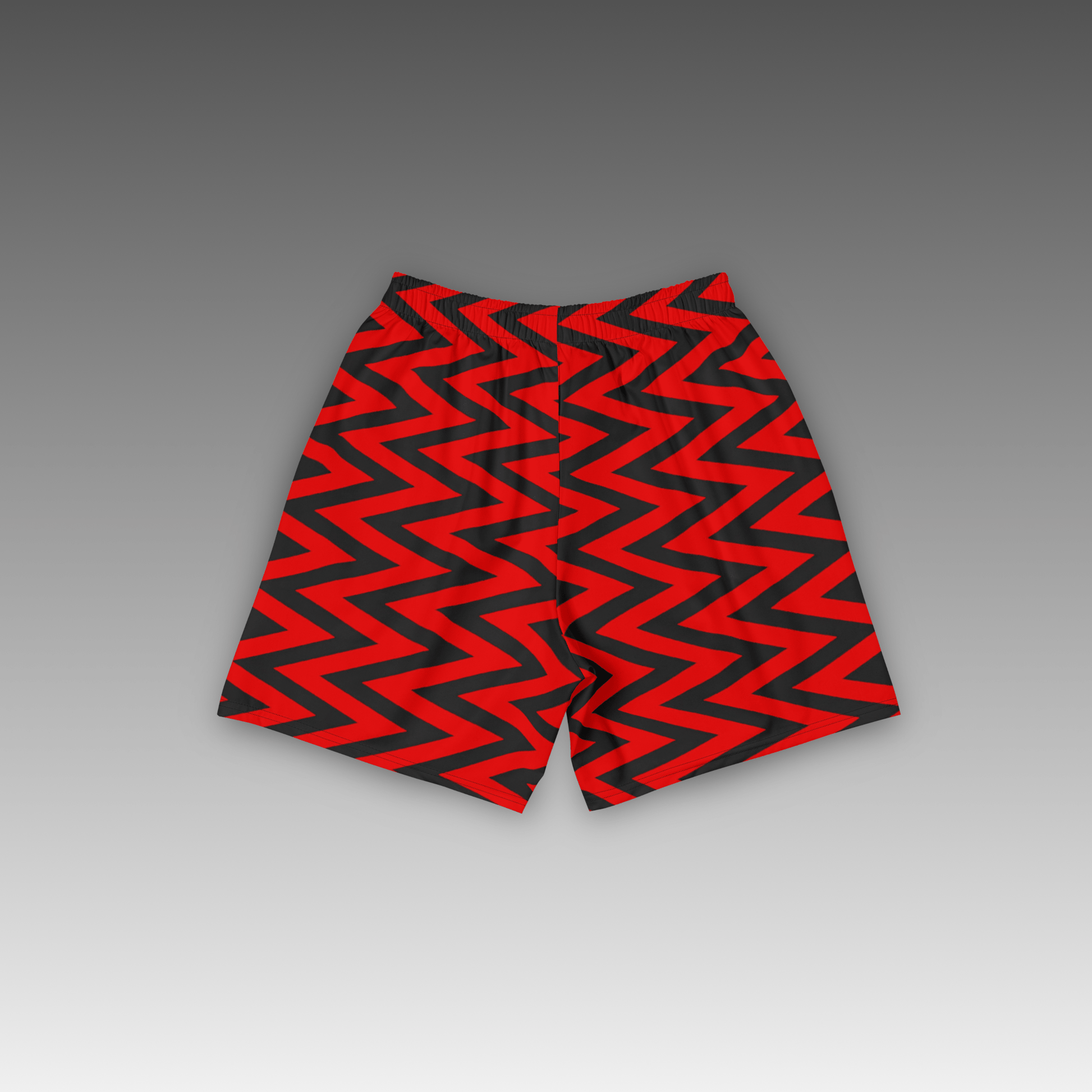 OTB Red Chevron Basketball Shorts - back view displaying the bold black chevron pattern on bright red fabric, highlighting the quality construction, elastic waistband, and basketball-ready design