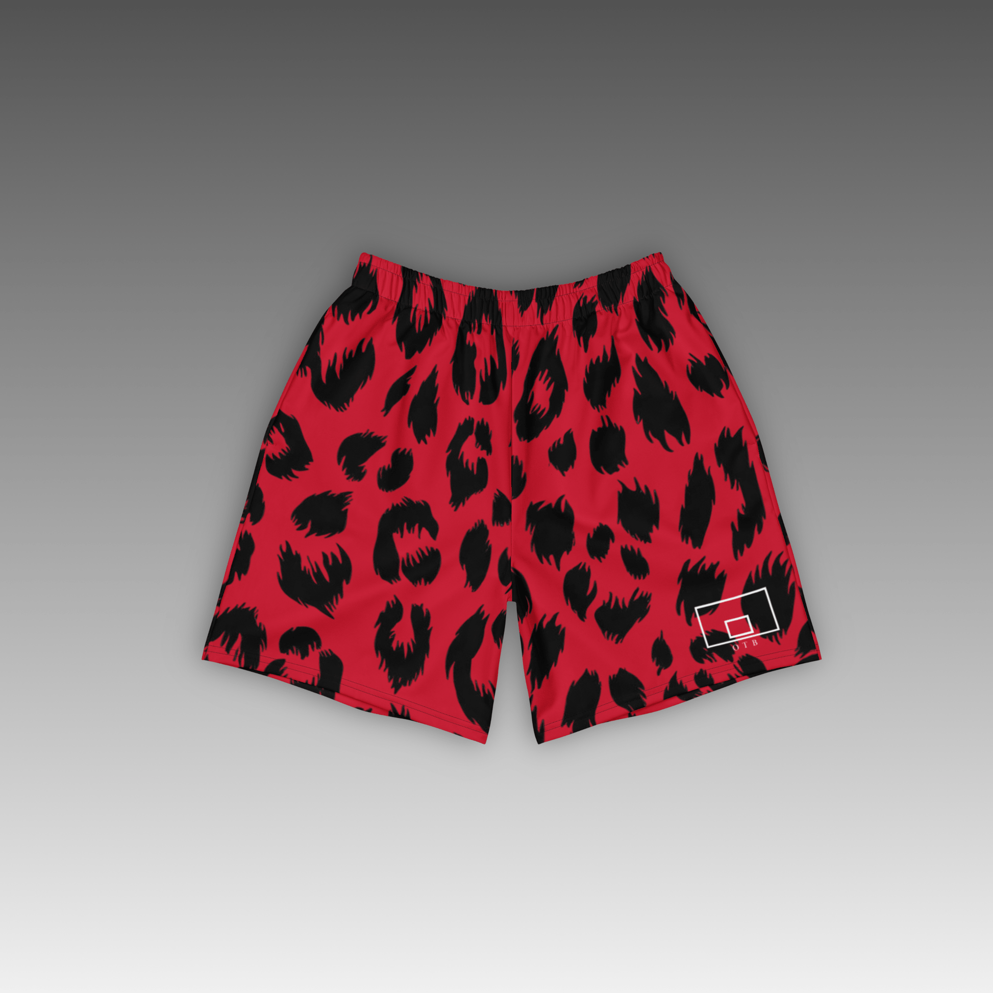 OTB Red Leopard Basketball Shorts - front view showcasing vibrant red shorts with bold leopard print pattern, featuring lightweight performance fabric and comfortable athletic fit for basketball players
